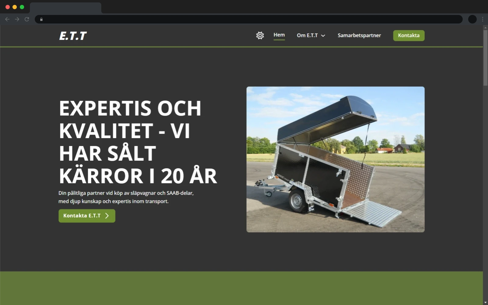 Bild på E.T.Ts landningssida i dark mode.